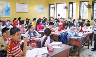 Học sinh lớp 5 trường Nguyễn Siêu sẽ phải làm bài test IQ, EQ để vào lớp 6. Ảnh: Hồng Vĩnh.