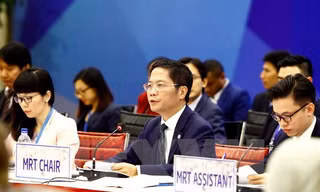 Bộ Trưởng Bộ Công thương Trần Tuấn Anh phát biểu tại hội nghị. (Ảnh: An Đăng/TTXVN)