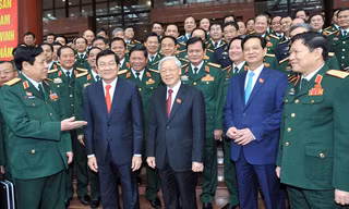 Tổng Bí thư Nguyễn Phú Trọng, Chủ tịch nước Trương Tấn Sang, Thủ tướng Nguyễn Tấn Dũng và các đại biểu trong ngày làm việc thứ hai của Đại hội (22/9). Ảnh: Trọng Đức - TTXVN.