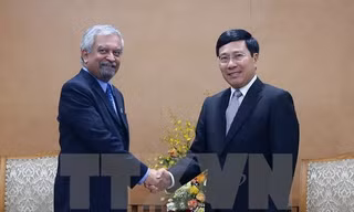 Phó Thủ tướng, Bộ trưởng Ngoại giao Phạm Bình Minh tiếp ông Kamal Malhotra, Điều phối viên thường trú, Trưởng Đại diện UNDP tại Việt Nam. (Ảnh: Nguyễn Khang/TTXVN)