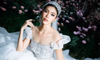 Dân tình xôn xao trước loạt ảnh mặc váy cưới của siêu mẫu Minh Tú sau khi chủ động cầu hôn bạn trai Tây