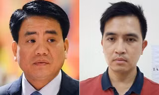 Bị can Nguyễn Đức Chung (phải) và Nguyễn Trường Giang 