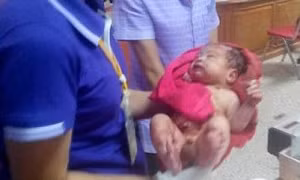 Bé sơ sinh sống sót thần kỳ sau khi bị đâm và chôn sống