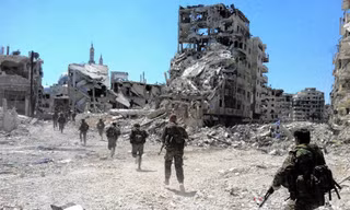 Một đơn vị hỗn hợp của Nga và Syria đang chiến đấu. Ảnh: Warontherocks.