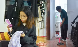 Thời tiết nồm ẩm, người Hà Nội lấy máy sấy tóc làm khô quần áo