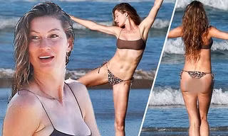 'Chân dài” đắt giá Gisele Bundchen mặc bikini nhảy múa trên biển