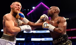 Mayweather và McGregor trong đại chiến hồi tháng 8 vừa qua