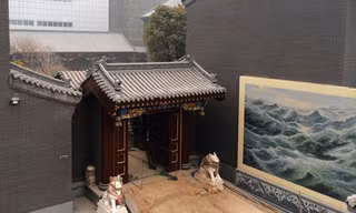Cổng vào “phủ tướng quân” của Cốc Tuấn San. Ảnh: WSJ