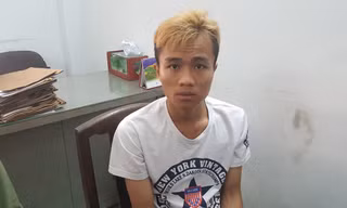 Nghi can Lợi Chí Cường tại cơ quan điều tra. Ảnh CA.