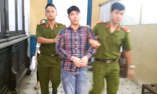 Trương Hoàng Trung tại tòa ngày 28/9. Ảnh: Tân Châu.