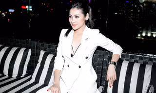 Á hậu Tú Anh mặc 'cây' vest trắng muốt, khoe vòng một gợi cảm