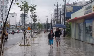 Hà Nội nhiều mây, mưa nhỏ rải rác