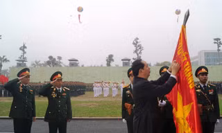 Chủ tịch nước Trần Đại Quang trao tặng Huân chương Quân công hạng Nhất cho Binh chủng Đặc công, ngày 19/3/2017. Ảnh: Nguyễn Minh