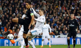 Marquinhos đeo băng thủ quân của PSG trong trận lượt đi đấu với Real. Ảnh: Reuters