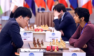 Quang Liêm cầm đen và chỉ có thể đạt kết quả hoà ở ván hai. Ảnh: Tbilisi2017.