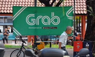 Grab là hãng cung cấp dịch vụ đi chung xe lớn nhất Đông Nam Á. Ảnh: Business Times