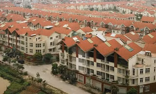 Thị trường bất động sản kỳ vọng loại bỏ những bất cập khi Luật Kinh doanh bất động sản sửa đổi được thông qua. Ảnh: VnExpress