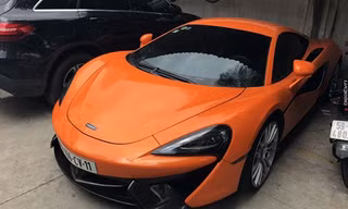 Siêu xe McLaren 570S, một trong nhiều tang vật bị thu giữ bởi công an. Ảnh: CA.