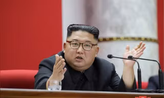 Ông Kim Jong Un phát biểu tại kỳ họp của đảng Lao động Triều Tiên. (Ảnh: KCNA)