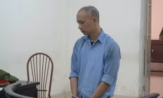 Nhiếp ảnh gia "rởm" tại phiên toà.