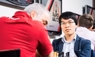 Quang Liêm và Kasparov trong trận đánh hôm qua 17/8. Ảnh: GCT.