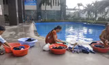 Thiếu nước sông Đà, dân chung cư Hà Nội ra bể bơi giặt giũ