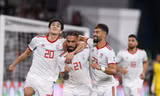 Các cầu thủ Iran ăn mừng trước Oman