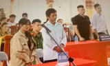 Các bị cáo tại tòa. Ảnh: Duy Chiến 