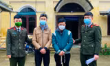 Đối tượng Nguyễn Phi Thịnh và Nguyễn Xuân Thìn tại cơ quan công an -Ảnh: TL