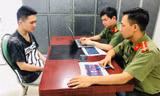 Đối tượng Nguyễn Minh Anh tại cơ quan công an. (ảnh: A.K)