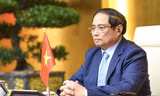Thủ tướng Phạm Minh Chính dự hội nghị bằng hình thức trực tuyến. (Ảnh: VGP)