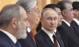 Tổng thống Nga Vladimir Putin đón tiếp lãnh đạo các nước thuộc Liên Xô cũ ngày 26/12. (Ảnh: EPA-EFE)