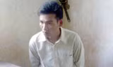 Đối tượng Nguyễn Vũ Khương tại cơ quan công an. 
