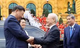 Tổng Bí thư Nguyễn Phú Trọng cùng Tổng Bí thư, Chủ tịch Trung Quốc Tập Cận Bình ngày 12/12/2023 tại Hà Nội. Ảnh: Như ý