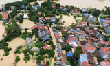 Tràn đê sông Bùi, 'rốn lũ' Chương Mỹ chìm trong biển nước
