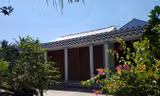 Ngôi nhà của em T. luôn đóng kín cửa. Ảnh: Nhật Huy.