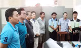 Các đối tượng tại cơ quan điều tra. Ảnh: Công an Nhân dân