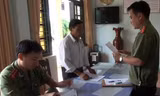 Ông Nguyễn Xuân Hiệp tại cơ quan công an. Ảnh: Công an cung cấp