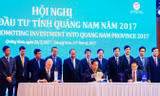 Thủ tướng chứng kiến lễ ký cam kết đầu tư giữa tỉnh Quảng Nam và các nhà đầu tư sáng 26/3. Ảnh H.V.