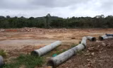 Một dự án phân lô bán nền trên đất nông nghiệp ở xã Dương Tơ bị lập biên bản, đình chỉ thi công. Ảnh: H.L.
