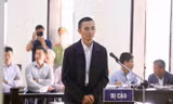 Ông Đặng Anh Tuấn tại tòa ngày 13/3/2020. Ảnh: Xuân Ân