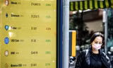 Giá các đồng tiền số quy đổi sang đôla ở Hong Kong ngày 21/12/2022ảnh: Getty
