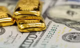 Giá vàng tăng mạnh, USD giảm sâu