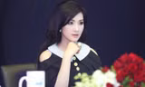 Hoa hậu Giáng My xinh đẹp, trẻ trung đi làm giám khảo