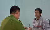 Đối tượng Nguyễn Đức Vinh tại cơ quan công an. Ảnh: Công an