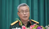 Lãnh đạo Trung tâm hành động bom mìn Quốc gia Việt Nam thông tin về kết quả thực hiện chương trình khắc phục hậu quả bom mìn sau chiến tranh. Ảnh: Nguyễn Minh