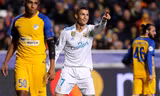 Ronaldo tiếp tục phong độ ấn tượng ở Champions League bằng cú đúp vào lưới APOEL. Ảnh: EPA.