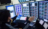 CIS đang mô tả cách anh theo dõi thị trường chứng khoán. Ảnh: Bloomberg