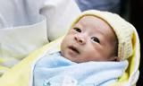 Bé Huy hồi phục diệu kỳ, chuẩn bị về với gia đình. Ảnh: BVNĐ cung cấp.
