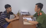 Dương Quang Hiếu tại cơ quan công an. Ảnh: Trị Bình